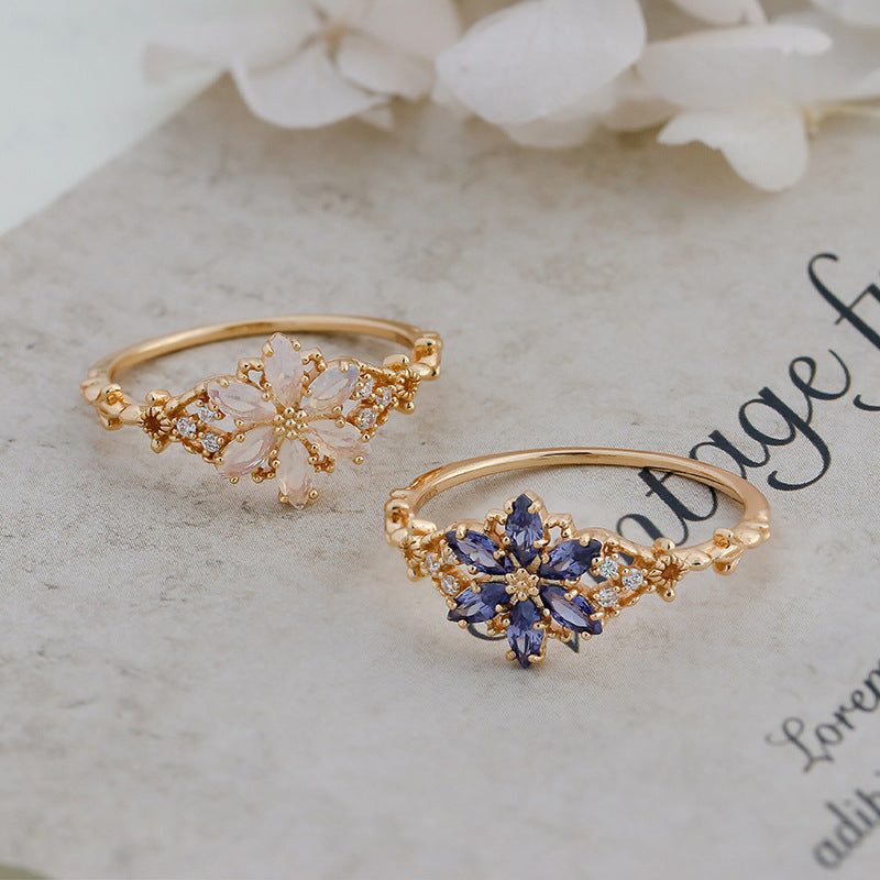 A light luxury Tanzanite zirconium/artificial opal ring