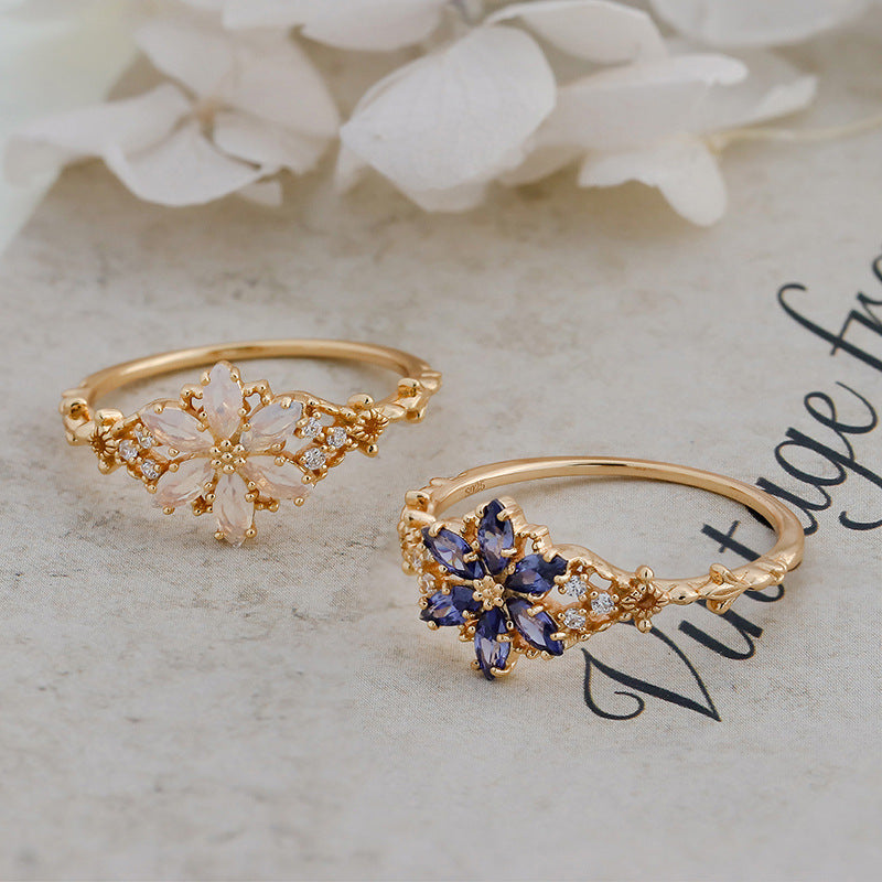 A light luxury Tanzanite zirconium/artificial opal ring